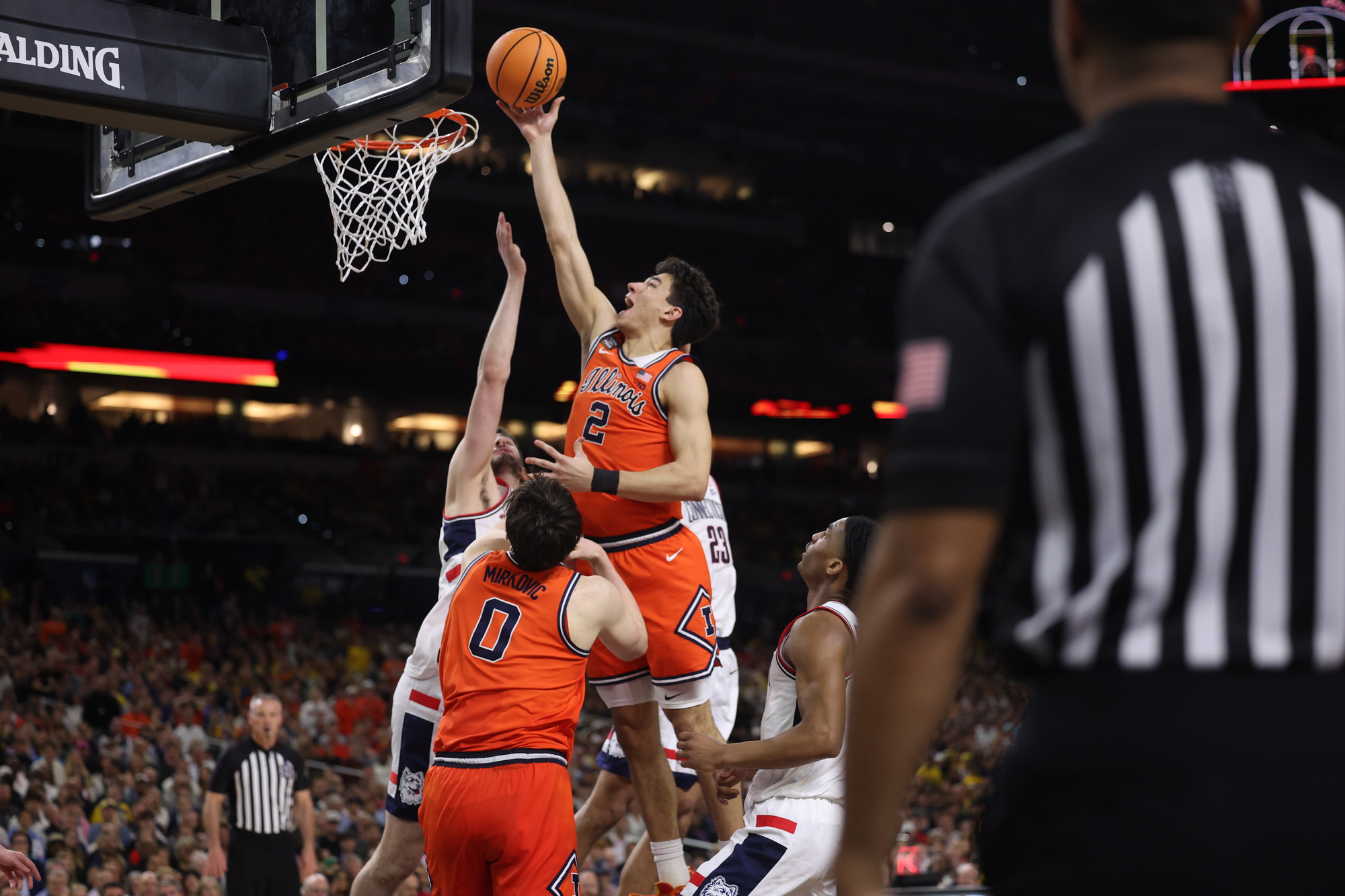 Illinois guard Andrej StojakoviÄ (2) makes a basket to cut...