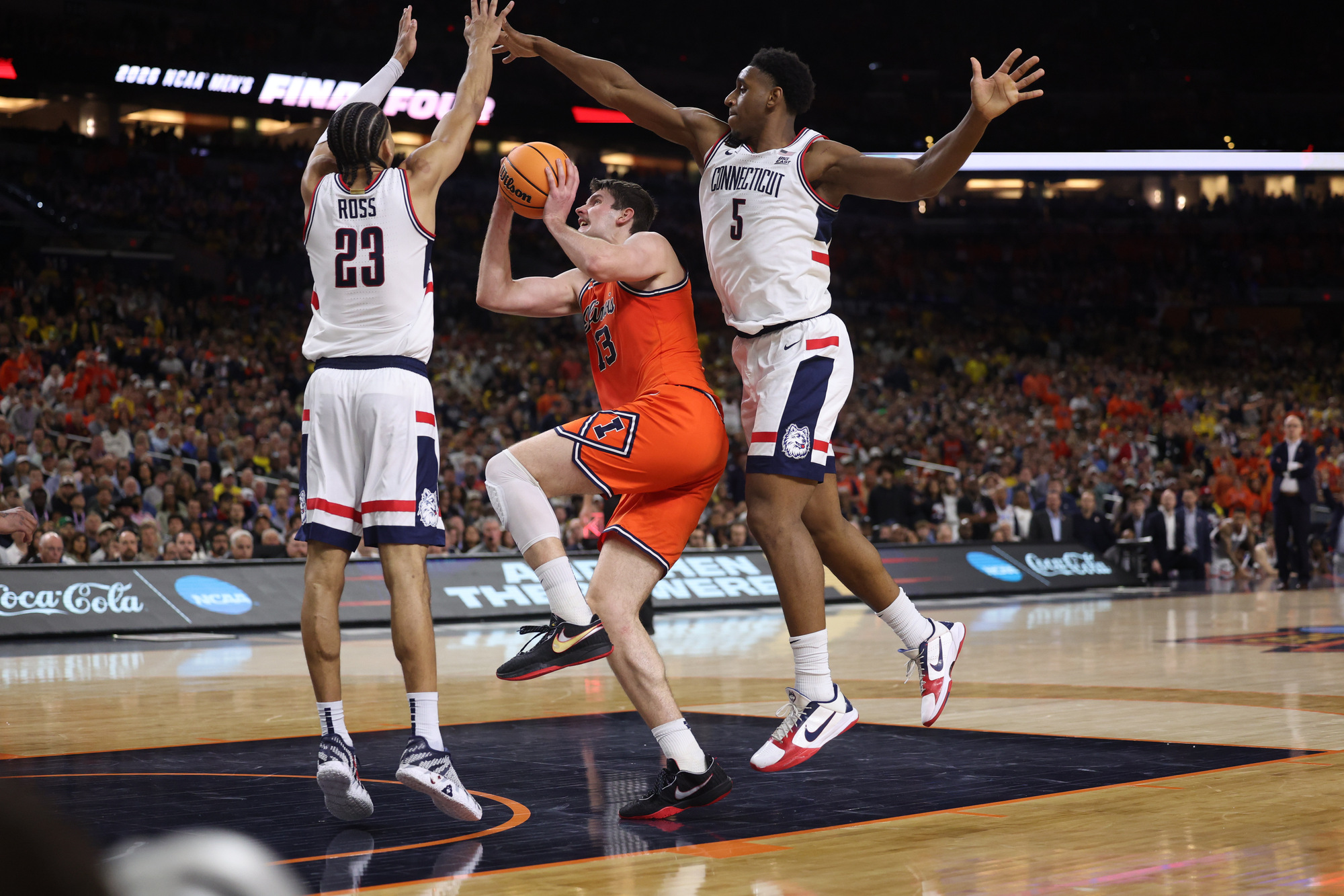 Illinois center Tomislav IviÅ¡iÄ (13) drives to the basket against...