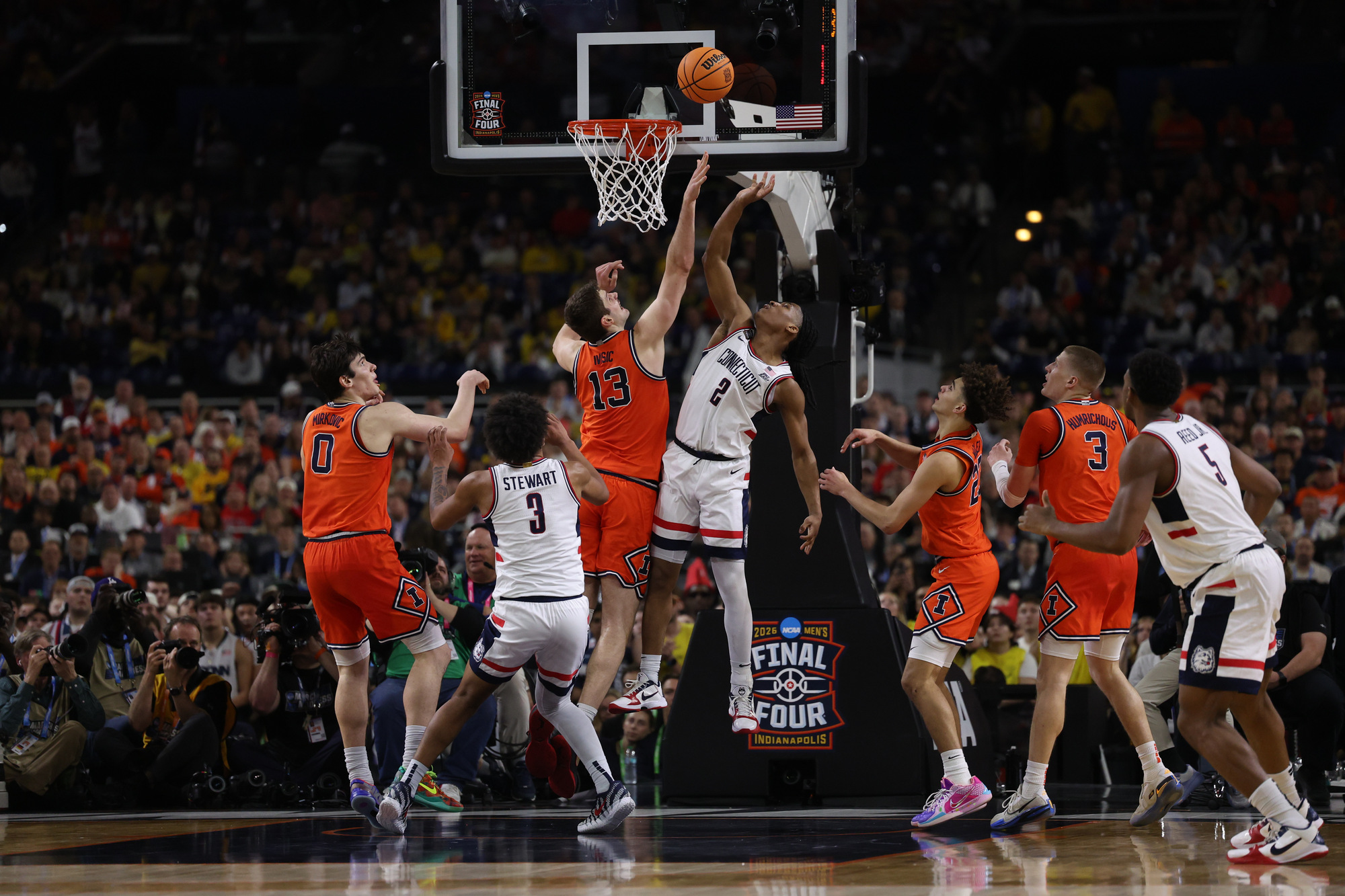 Illinois center Tomislav IviÅ¡iÄ (13) blocks a shot from UConn...
