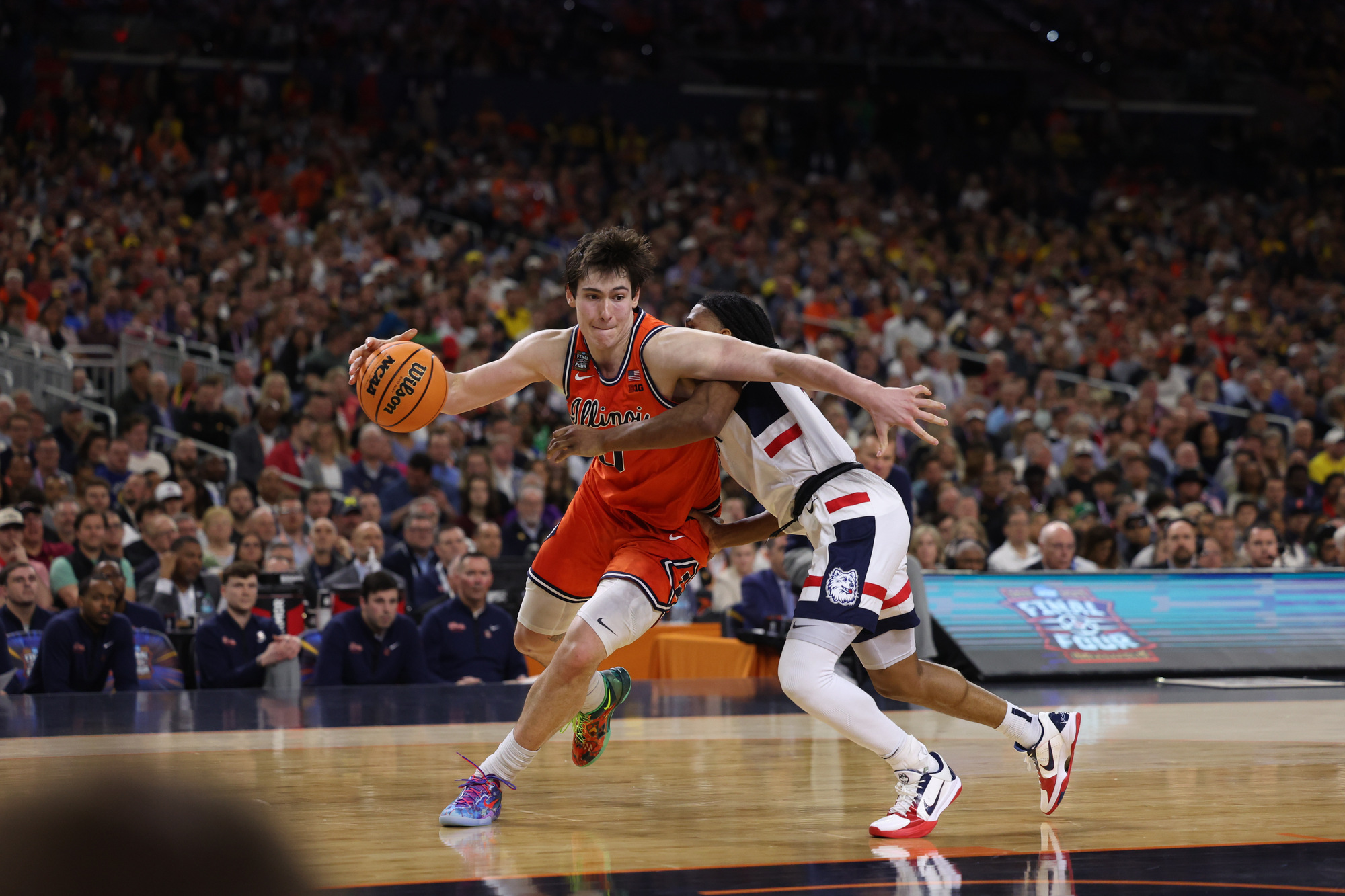 UConn guard Silas Demary Jr. (2) fouls Illinois forward David...