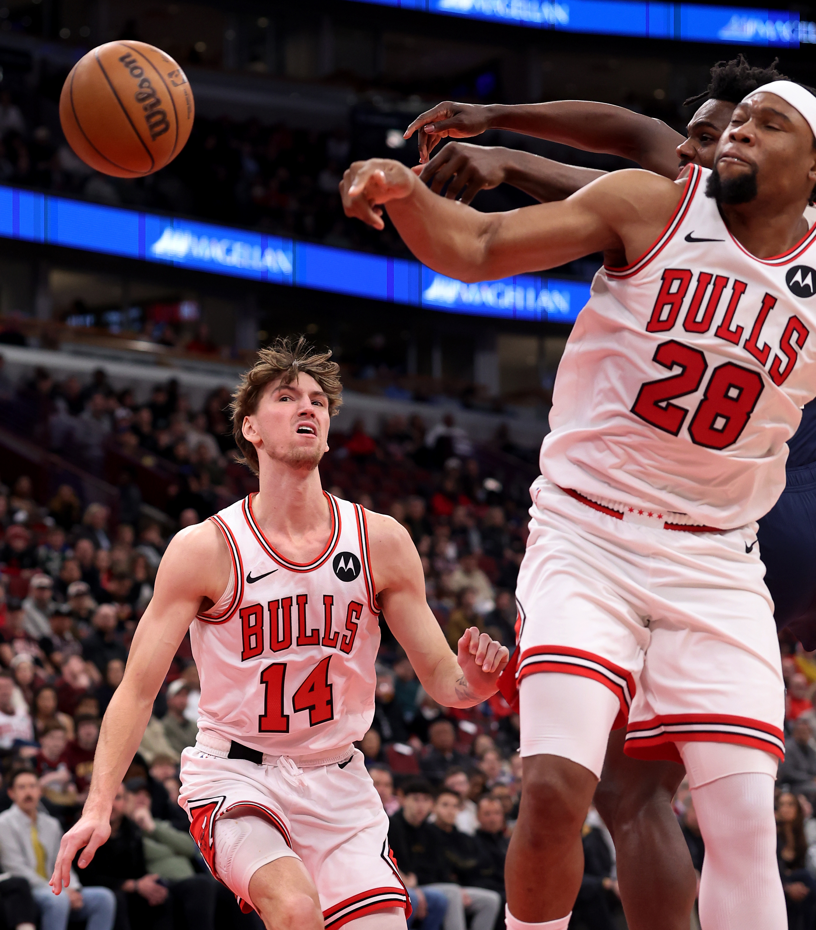 Chicago Bulls forward Matas Buzelis (14) keeps his eyes on the ball as his teammate Guerschon Yabusele (28) tries to pull in a rebound in the first half of a game against the Indiana Pacers at the United Center in Chicago on April 1, 2026. (Chris Sweda/Chicago Tribune)