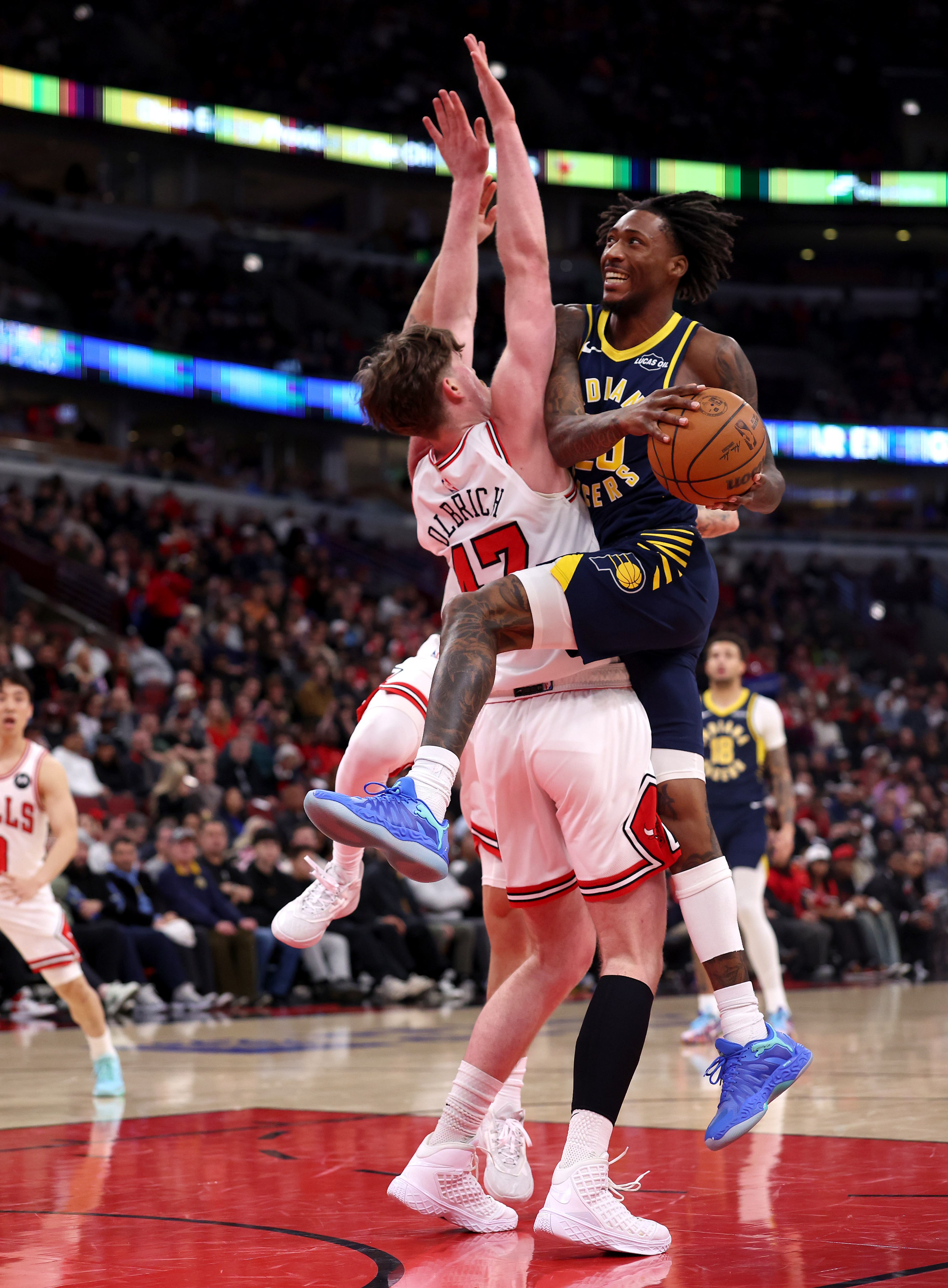 Indiana Pacers guard Quenton Jackson (29) drives on Chicago Bulls center Lachlan Olbrich (47) in the first half of a game at the United Center in Chicago on April 1, 2026. (Chris Sweda/Chicago Tribune)