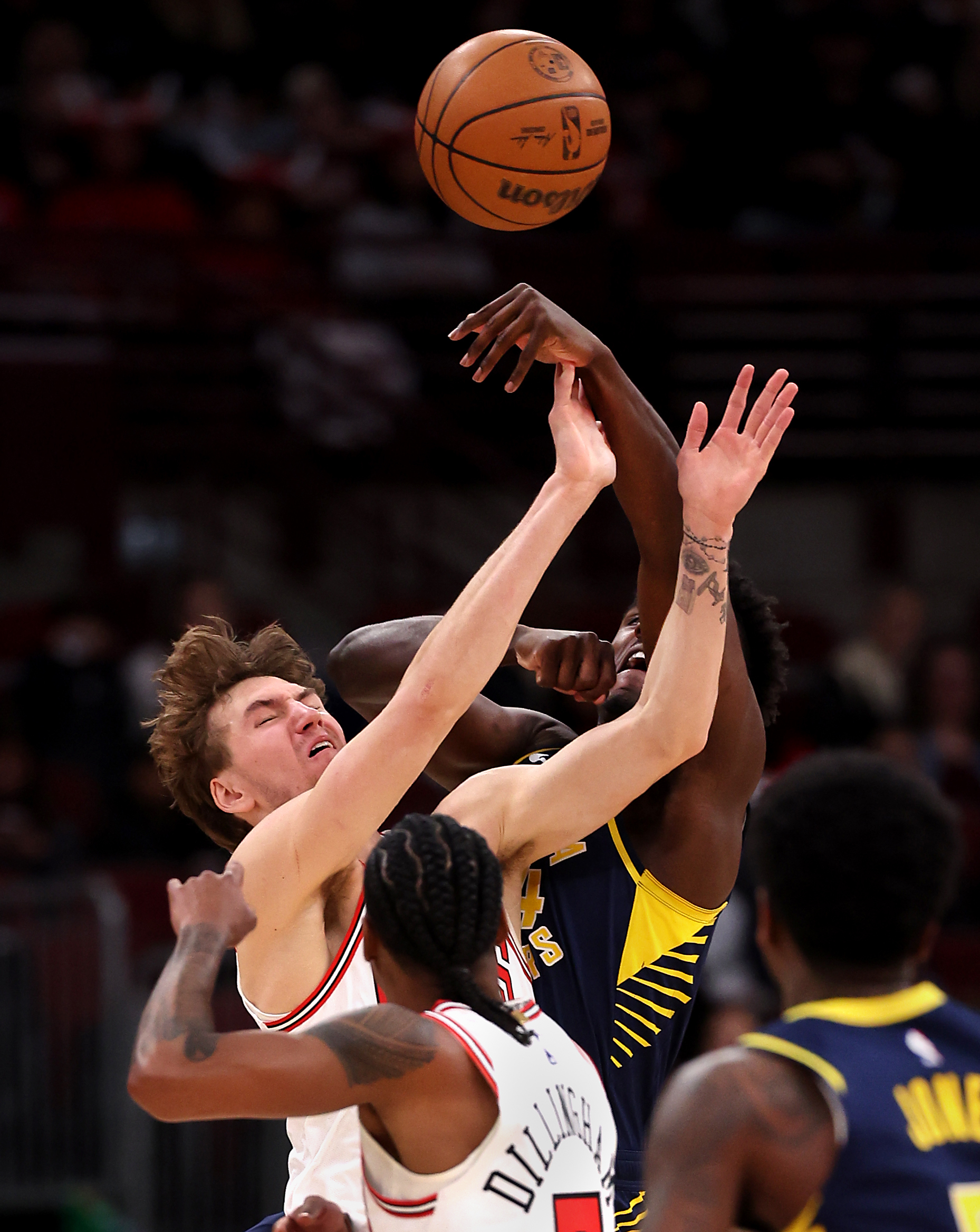 Chicago Bulls forward Matas Buzelis (14) tries to pull down a loose ball in the first half of a game against the Indiana Pacers at the United Center in Chicago on April 1, 2026. (Chris Sweda/Chicago Tribune)