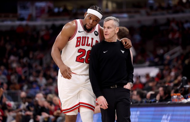 Chicago Bulls forward Guerschon Yabusele (28) chats with head coach Billy Donovan in the second half of a game against the Indiana Pacers at the United Center in Chicago on April 1, 2026. (Chris Sweda/Chicago Tribune)