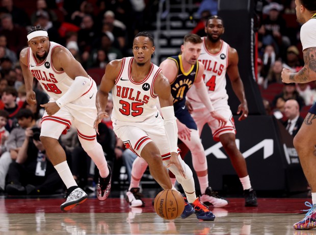 Chicago Bulls forward/guard Isaac Okoro (35) starts a fast break in the second half of a game against the Indiana Pacers at the United Center in Chicago on April 1, 2026. (Chris Sweda/Chicago Tribune)