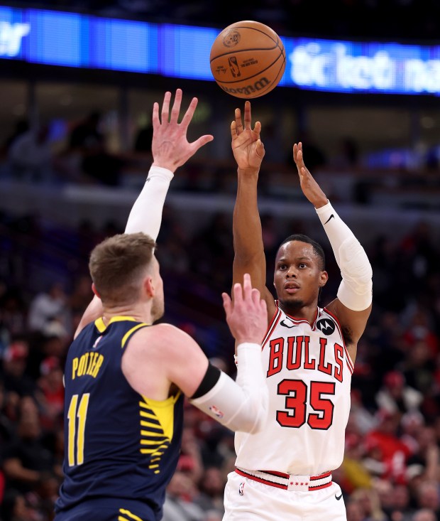 Chicago Bulls forward/guard Isaac Okoro (35) shoots over Indiana Pacers center Micah Potter (11) in the second half of a game at the United Center in Chicago on April 1, 2026. (Chris Sweda/Chicago Tribune)