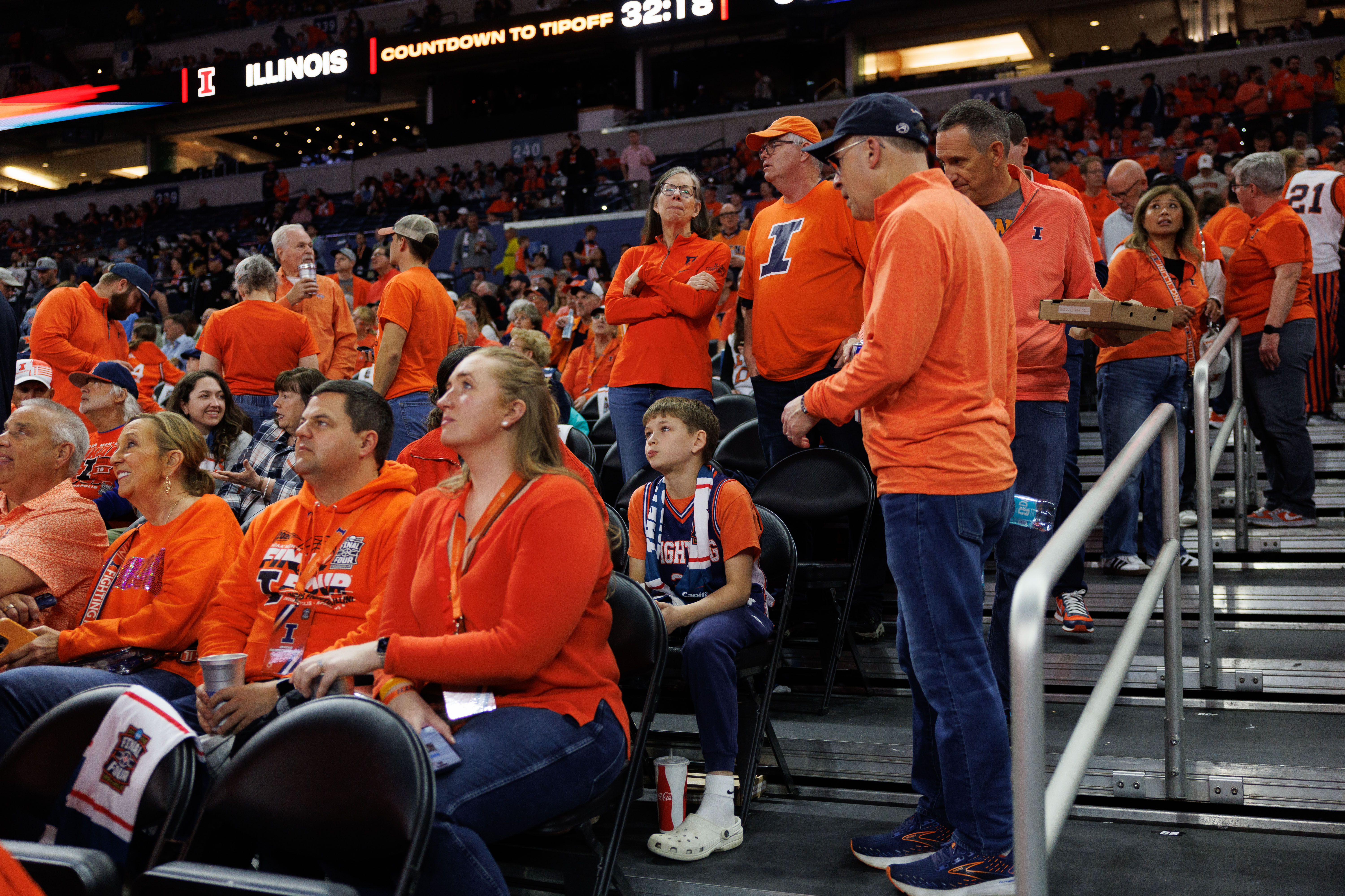 Fans take their seats before the Final Four game between...