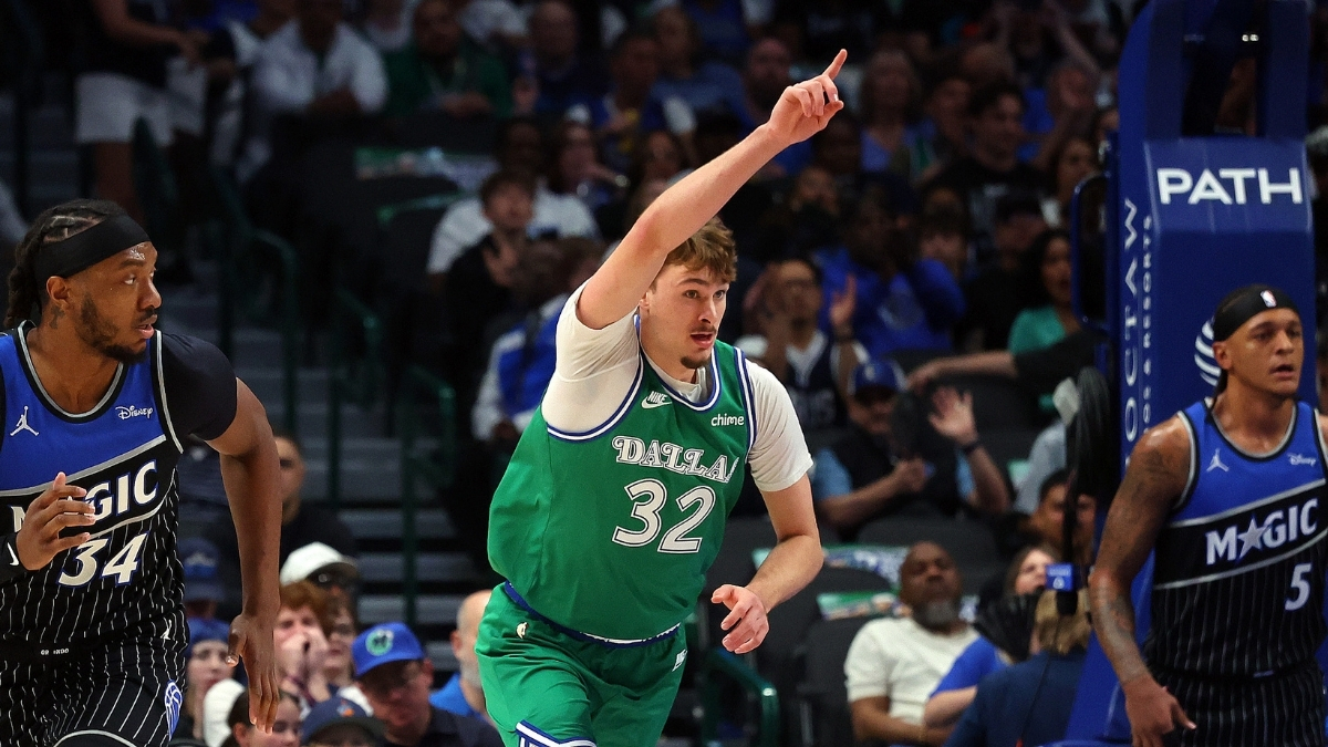 Cooper Flagg #32 of the Dallas Mavericks celebrates a shot during a career-high 51-point game against the Orlando Magic at American Airlines Center.