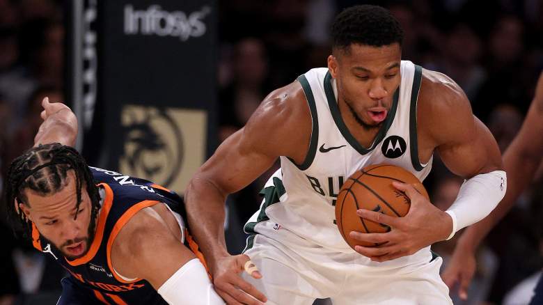 Giannis Antetokounmpo #34 of the Milwaukee Bucks tries to keep the ball from Jalen Brunson #11 of the New York Knicks