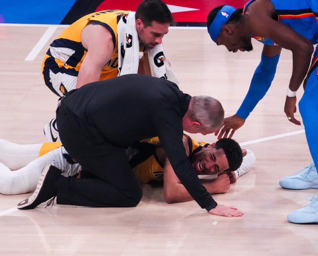 Tyrese Haliburton down of Indiana Pacers reacts after suffering an injury during game seven of the 2024-2025 season NBA Finals between Oklahoma City Thunder and Indiana Pacers in Oklahoma City, the United States, June 22, 2025. 