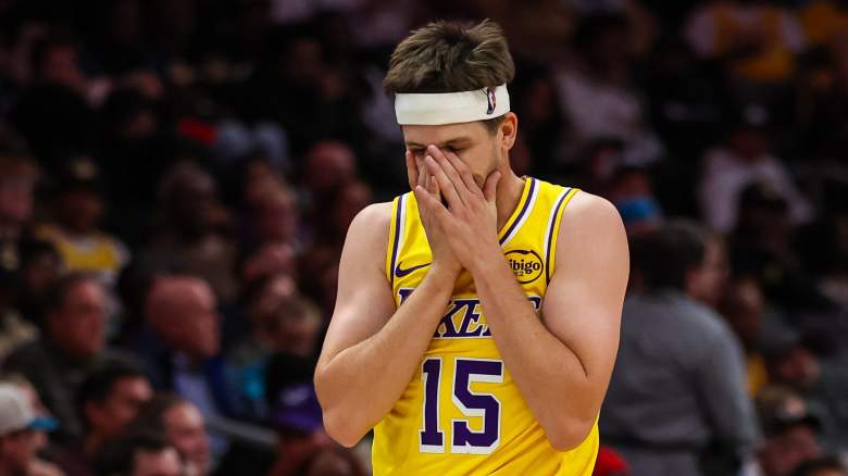 Austin Reaves reacts with hands on his face during Lakers game amid trade speculation