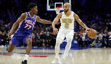 PHILADELPHIA, PENNSYLVANIA - NOVEMBER 11: Derrick White #9 of the Boston Celtics drives against VJ Edgecombe #77 of the Philadelphia 76ers during the second half at Xfinity Mobile Arena on November 11, 2025 in Philadelphia, Pennsylvania. NOTE TO USER: User expressly acknowledges and agrees that, by downloading and or using this photograph, User is consenting to the terms and conditions of the Getty Images License Agreement. (Photo by Emilee Chinn/Getty Images)
