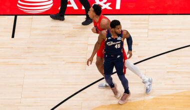 TORONTO, ON - NOVEMBER 24: Scottie Barnes #4 of the Toronto Raptors reacts after a basket as Donovan Mitchell #45 of the Cleveland Cavaliers looks on during first half action at Scotiabank Arena on November 24, 2025 in Toronto, Ontario, Canada. NOTE TO USER: User expressly acknowledges and agrees that, by downloading and/or using this Photograph, user is consenting to the terms and conditions of the Getty Images License Agreement. (Photo by Andrew Lahodynskyj/Getty Images)