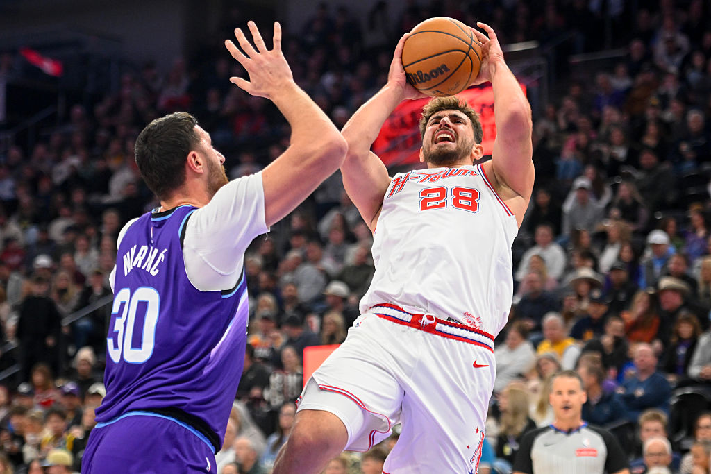 SALT LAKE CITY, UTAH - DECEMBER 01: Alperen Sengun #28 of the Houston Rockets shoots over Jusuf Nurkic #30 of the Utah Jazz during the first half of the game at Delta Center on December 01, 2025 in Salt Lake City, Utah. NOTE TO USER: User expressly acknowledges and agrees that, by downloading and or using this photograph, User is consenting to the terms and conditions of the Getty Images License Agreement. (Photo by Alex Goodlett/Getty Images)