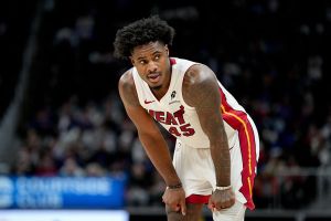 DETROIT, MICHIGAN - JANUARY 01: Davion Mitchell #45 of the Miami Heat looks on against the Detroit Pistons at Little Caesars Arena on January 01, 2026 in Detroit, Michigan. NOTE TO USER: User expressly acknowledges and agrees that, by downloading and or using this photograph, User is consenting to the terms and conditions of the Getty Images License Agreement. (Photo by Nic Antaya/Getty Images)
