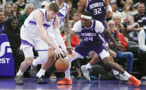SALT LAKE CITY, UT - FEBRUARY 11: Kyle Filipowski #22 of the Utah Jazz battles for a loose ball with Daeqwon Plowden #29 of the Sacramento Kings during the second half of their game at the Delta Center on February 11, 2026 in Salt Lake City, Utah. NOTE TO USER: User expressly acknowledges and agrees that, by downloading and or using this photograph, User is consenting to the terms and conditions of the Getty Images License Agreement.(Photo by Chris Gardner/Getty Images)