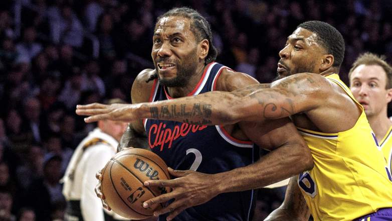 LA Clippers forward Kawhi Leonard (2) drives to the basket against Los Angeles Lakers guard Marcus Smart (36)