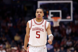 NASHVILLE, TENNESSEE - MARCH 15: Darius Acuff Jr. #5 of the Arkansas Razorbacks looks on during the first half of a game against the Vanderbilt Commodores in the 2026 SEC Men's Basketball Tournament Championship at Bridgestone Arena on March 15, 2026 in Nashville, Tennessee. (Photo by Johnnie Izquierdo/Getty Images)