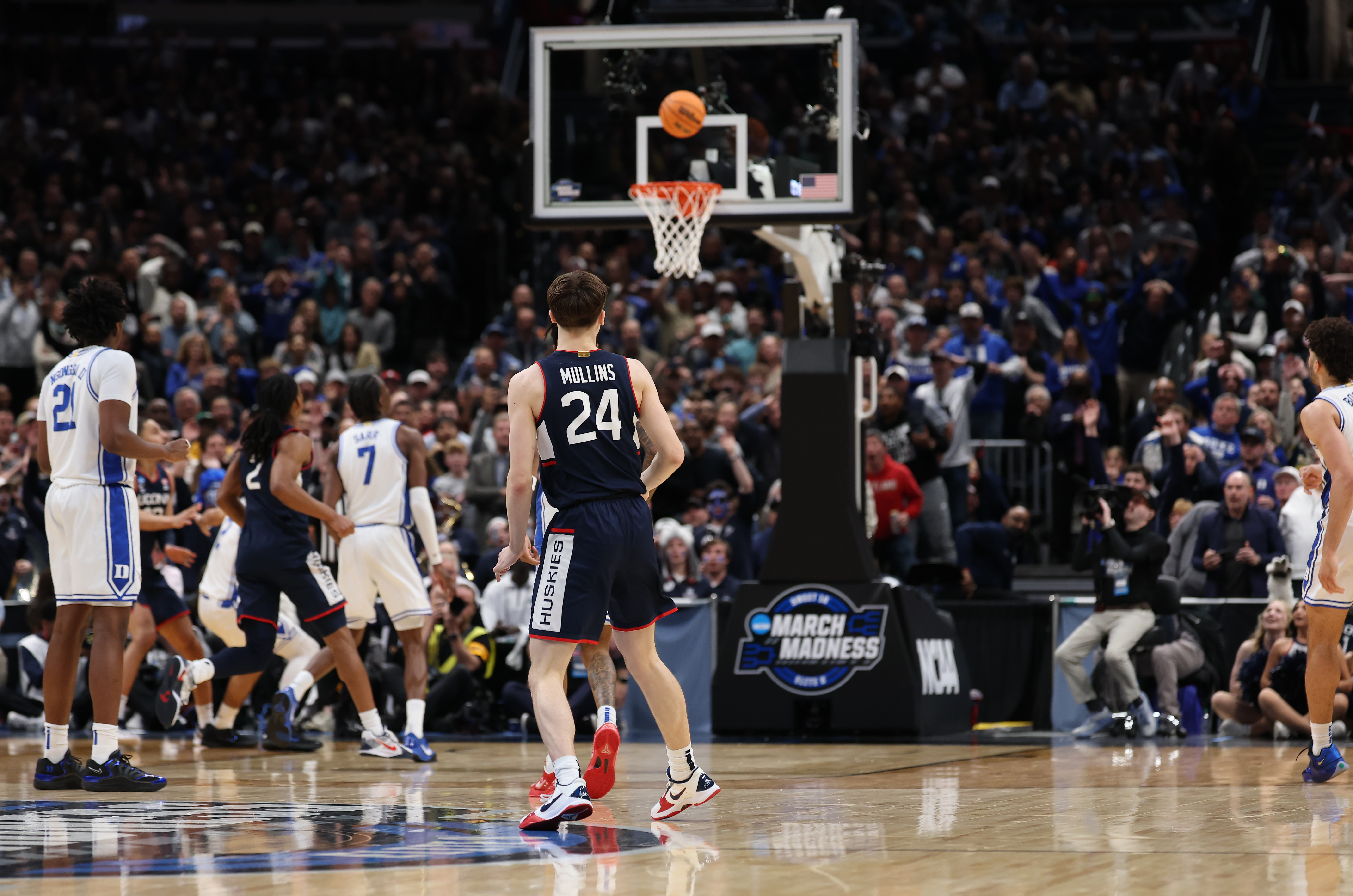 Braylon Mullins of the UConn Huskies hits the game winning shot with .04 seconds left against the Duke Blue Devils in the Elite Eight