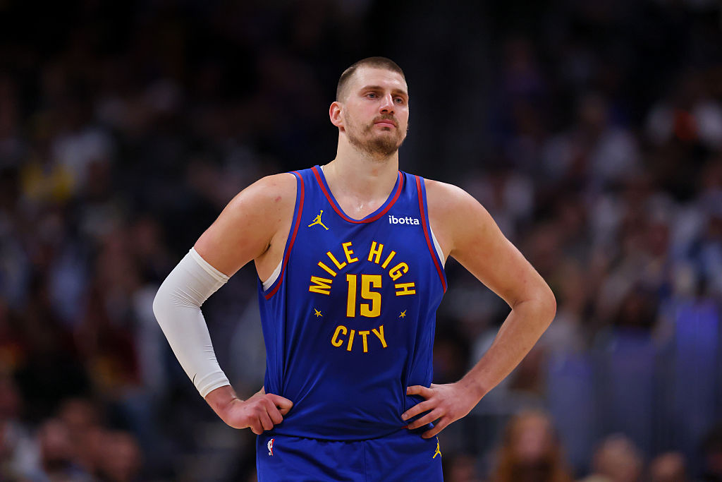 DENVER, CO - MARCH 29: Nikola Jokic #15 of the Denver Nuggets looks on during the second quarter against the Golden State Warriors at Ball Arena on March 29, 2026 in Denver, Colorado. NOTE TO USER: User expressly acknowledges and agrees that, by downloading and or using this photograph, User is consenting to the terms and conditions of the Getty Images License Agreement. (Photo by Justin Edmonds/Getty Images)