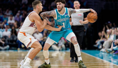 CHARLOTTE, NORTH CAROLINA - APRIL 02: LaMelo Ball #1 of the Charlotte Hornets brings the ball up court while guarded by Grayson Allen #8 of the Phoenix Suns in the first half during their game at Spectrum Center on April 02, 2026 in Charlotte, North Carolina. NOTE TO USER: User expressly acknowledges and agrees that, by downloading and or using this photograph, User is consenting to the terms and conditions of the Getty Images License Agreement. (Photo by Jacob Kupferman/Getty Images)