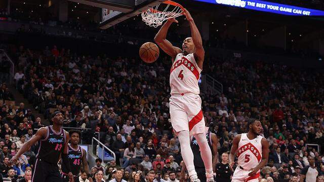Forward Scottie Barnes #4 of the Toronto Raptors soars in for a dunk as the Toronto Raptors play the Miami Heat at Scotiabank Arena in Toronto. April 7, 2026.