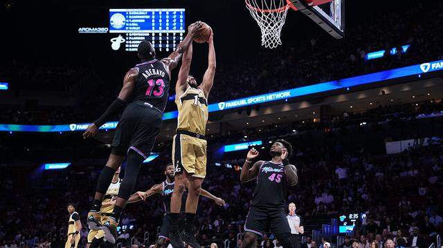 Bam Adebayo #13 of the Miami Heat blocks a shot attempt by Cam Whitmore #1 of the Washington Wizards during the first quarter at Kaseya Center on April 04, 2026 in Miami.