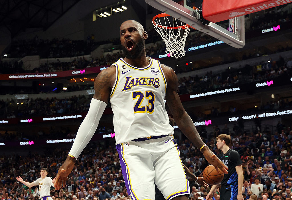 DALLAS, TEXAS - APRIL 05: LeBron James #23 of the Los Angeles Lakers reacts after a dunk against the Dallas Mavericks in the second half of a game at American Airlines Center on April 05, 2026 in Dallas, Texas. NOTE TO USER: User expressly acknowledges and agrees that, by downloading and or using this photograph, User is consenting to the terms and conditions of the Getty Images License Agreement. (Photo by Richard Rodriguez/Getty Images)