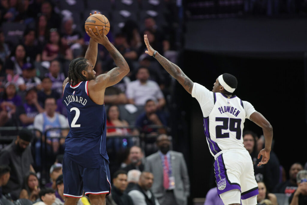SACRAMENTO, CALIFORNIA - APRIL 05: Kawhi Leonard #2 of the Los Angeles Clippers shoots over Daeqwon Plowden #29 of the Sacramento Kings during the second half at Golden 1 Center on April 05, 2026 in Sacramento, California. NOTE TO USER: User expressly acknowledges and agrees that, by downloading and or using this photograph, User is consenting to the terms and conditions of the Getty Images License Agreement. (Photo by Don Collier/Getty Images)
