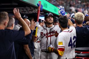 ATLANTA, GEORGIA - APRIL 15: Austin Riley #27 of the Atlanta Braves celebrates with teammates after a home run against the Miami Marlins in the sixth inning at Truist Park on April 15, 2026 in Atlanta, Georgia. All players are wearing the number 42 in honor of Jackie Robinson Day. (Photo by Brett Davis/Getty Images)