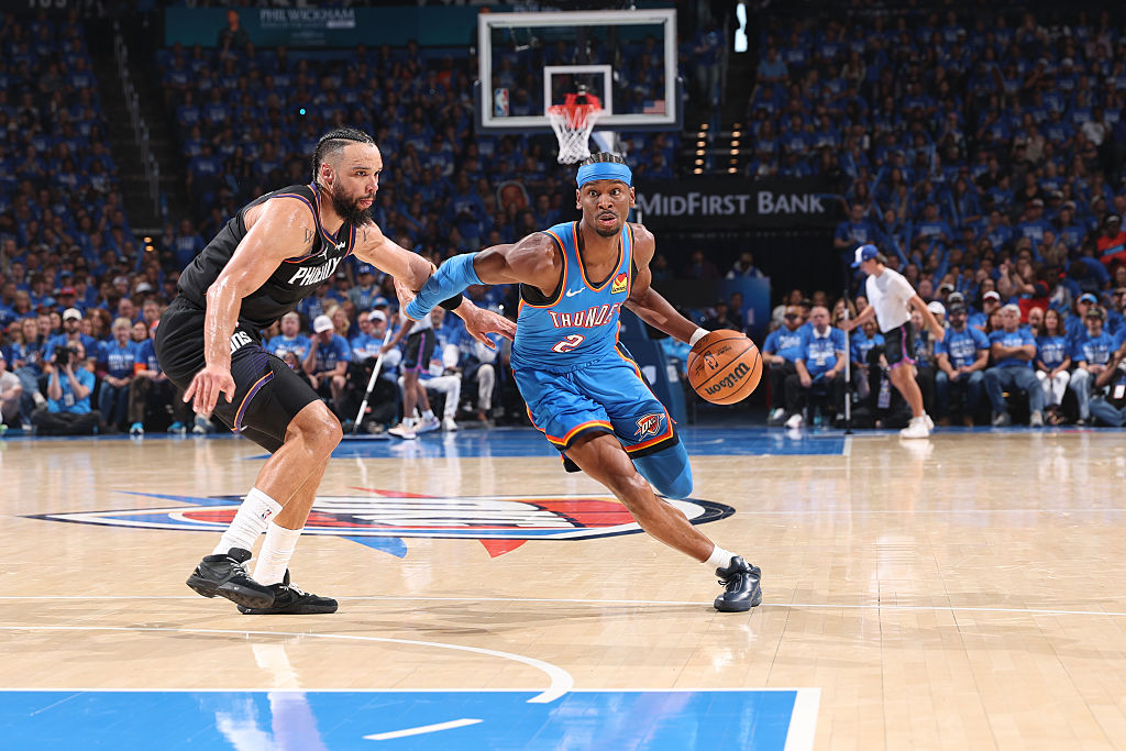 OKLAHOMA CITY, OK - APRIL 19: Shai Gilgeous-Alexander #2 of the Oklahoma City Thunder drives to the basket during the game against the Phoenix Suns during Round One Game One of the 2026 NBA Playoffs on April 19, 2026 at Paycom Center in Oklahoma City, Oklahoma. NOTE TO USER: User expressly acknowledges and agrees that, by downloading and or using this photograph, User is consenting to the terms and conditions of the Getty Images License Agreement. Mandatory Copyright Notice: Copyright 2026 NBAE (Photo by Zach Beeker/NBAE via Getty Images)