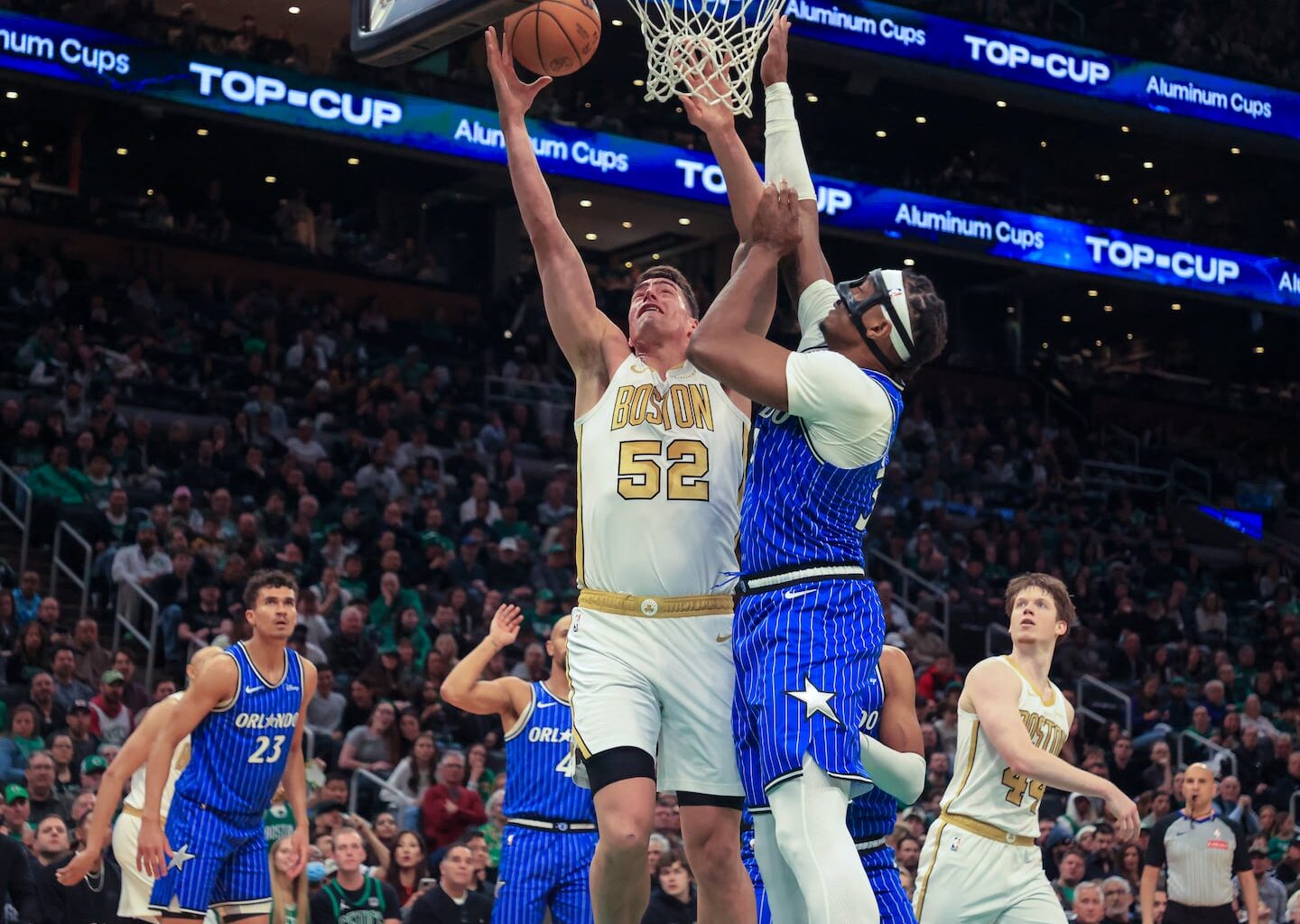Luka Garza goes up over Orlando's Wendell Carter for 2 of his 27 points in the Celtics' victory over the Magic Sunday at TD Garden.