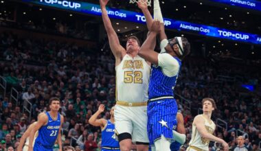 Luka Garza goes up over Orlando's Wendell Carter for 2 of his 27 points in the Celtics' victory over the Magic Sunday at TD Garden.