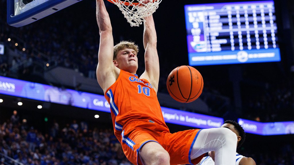 Florida Gators forward Thomas Haugh (10) dunks the ball during the first half against the Kentucky Wildcats at Rupp Arena at Central Bank Center.