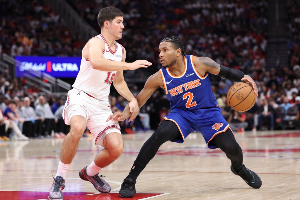 Miles McBride looks to make a move on Reed Sheppard during the Knicks' 111-94 loss to the Rockets on March 31, 2026 in Houston.