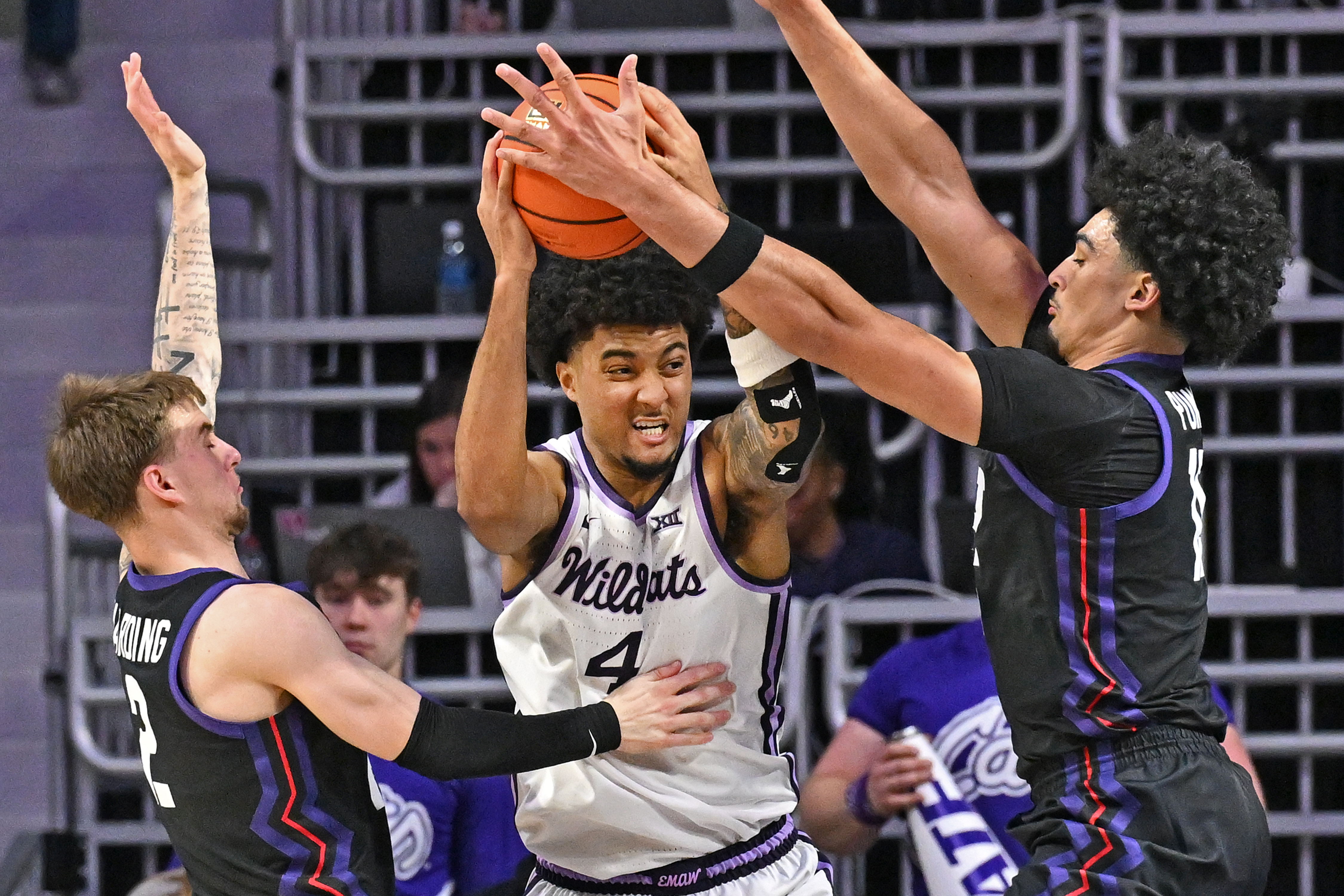 K-State guard P.J. Haggerty battles a TCU double team