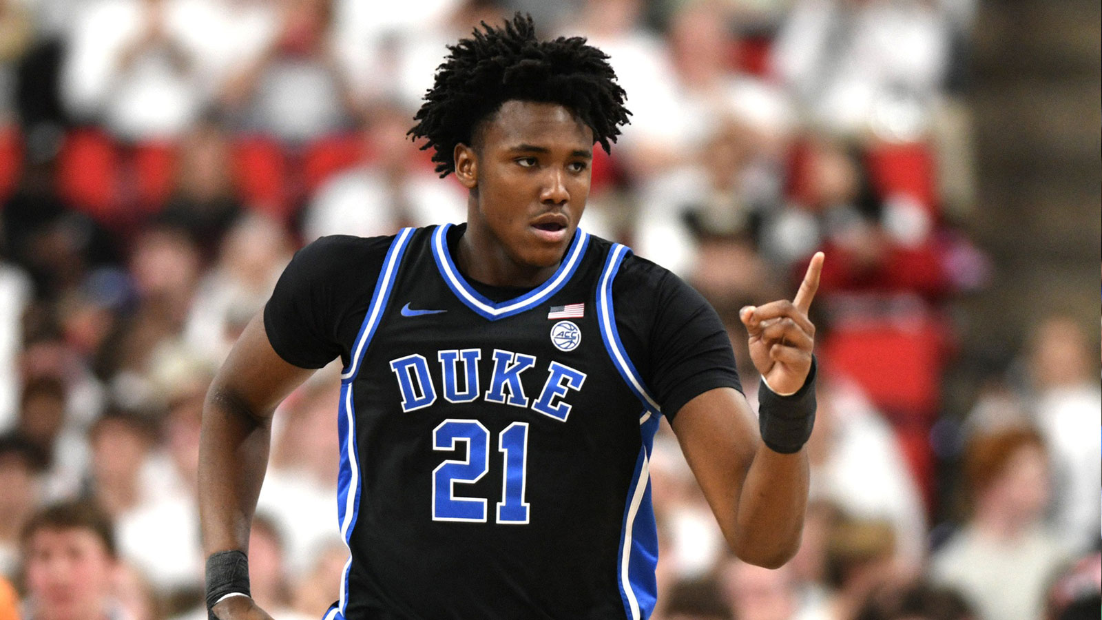 Duke Blue Devils center Patrick Ngongba II (21) reacts after scoring against the NC State Wolfpack during the first half at Lenovo Center.