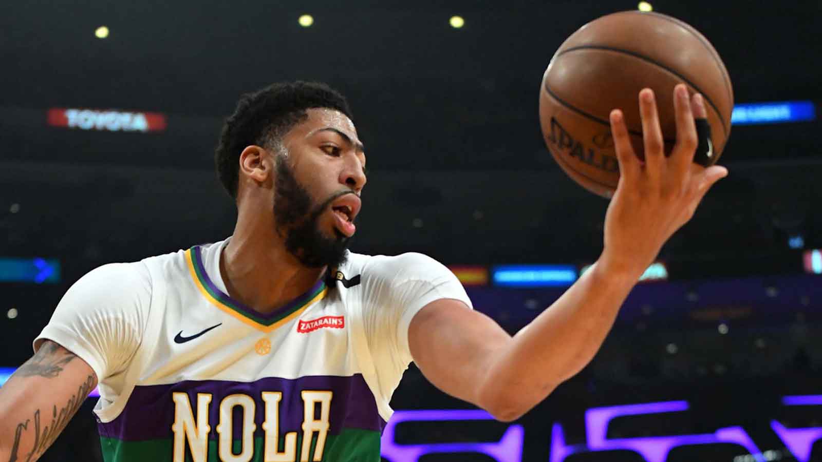 Pelicans forward Anthony Davis (23) grabs a rebound in the first half of the game against the Los Angeles Lakers at Staples Center
