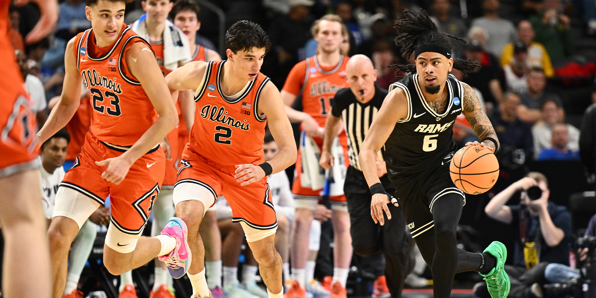 VCU basketball player Terrence Hill is chased up the court