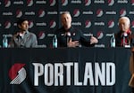 (Left to right) The new owners of the Portland Trailblazers, Sheel Tyle, Tom Dundon, and Andrew Cherng, make their first appearance at the Moda Center, April 2, 2026. 