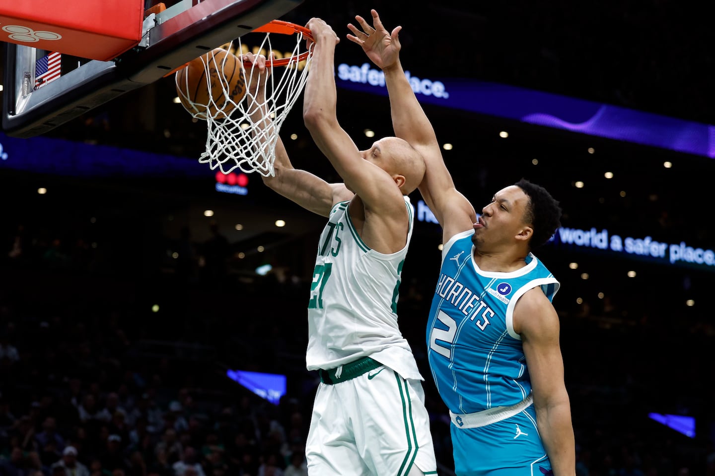 With former Celtic Grant Williams defending, Jordan Walsh threw down a two-handed slam dunk for the Celtics during a third-quarter spurt in Tuesday night's 113-102 victory over the Hornets at TD Garden.