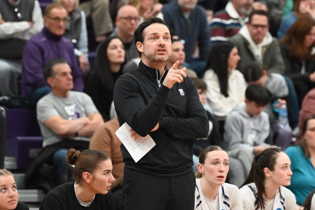 University of Scranton's head coach Ben O'Brien guides his players from the bench during the NCAA Division III second round game against Otterbein at the University of Scranton in Scranton on Saturday, March 07, 2026. (REBECCA PARTICKA/STAFF PHOTOGRAPHER)