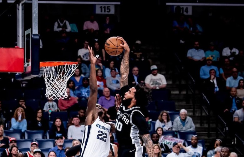 Julian Champagnie serves up a basket during a recent game. 
