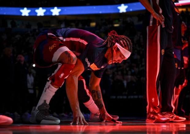 Aaron Gordon (32) of the Denver Nuggets stretches before the game against the Houston Rockets at Ball Arena in Denver on Wednesday, March 11, 2026. (Photo by AAron Ontiveroz/The Denver Post)