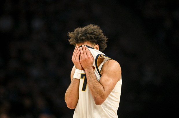 Jamal Murray (27) of the Denver Nuggets wipes his face during the third quarter of the Minnesota Timberwolves' 112-96 win in game four of their NBA Playoffs series at the Target Center in Minneapolis, Minnesota on Saturday, April 25, 2026. (Photo by AAron Ontiveroz/The Denver Post)
