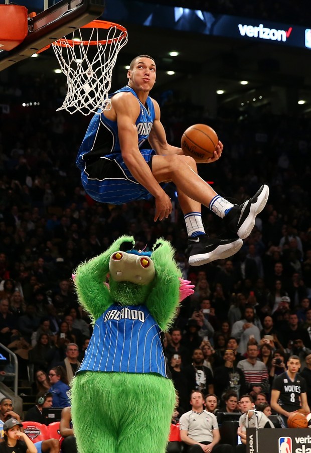 Aaron Gordon of the Orlando Magic dunks over Stuff the Orlando Magic mascot in the Verizon Slam Dunk Contest during NBA All-Star Weekend 2016 at Air Canada Centre on Feb. 13, 2016 in Toronto, Canada. (Photo by Elsa/Getty Images)