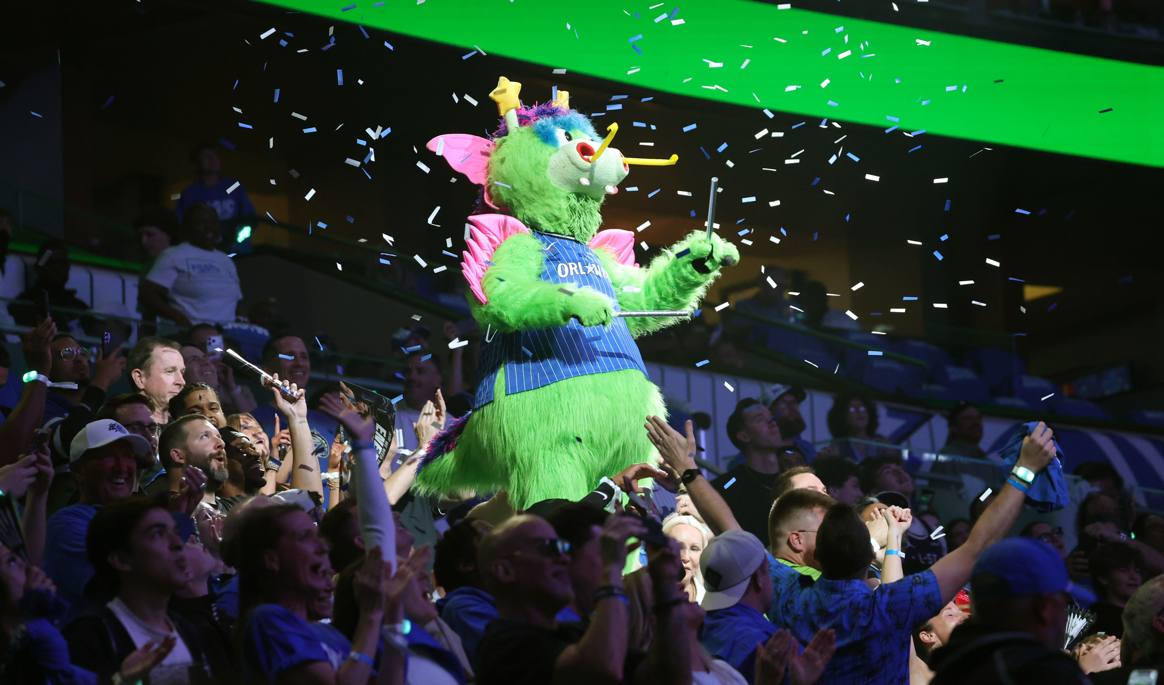 Orlando mascot STUFF celebrates with fans during the Charlotte Hornets...