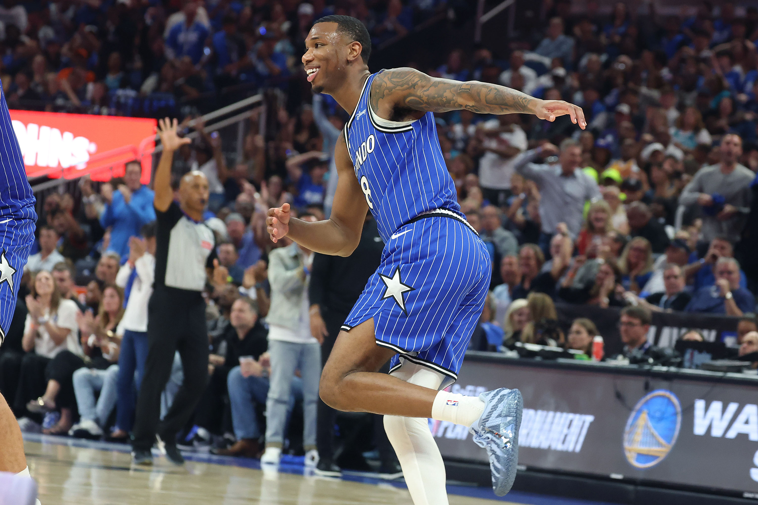 Orlando forward Jamal Cain celebrates during the Charlotte Hornets at...