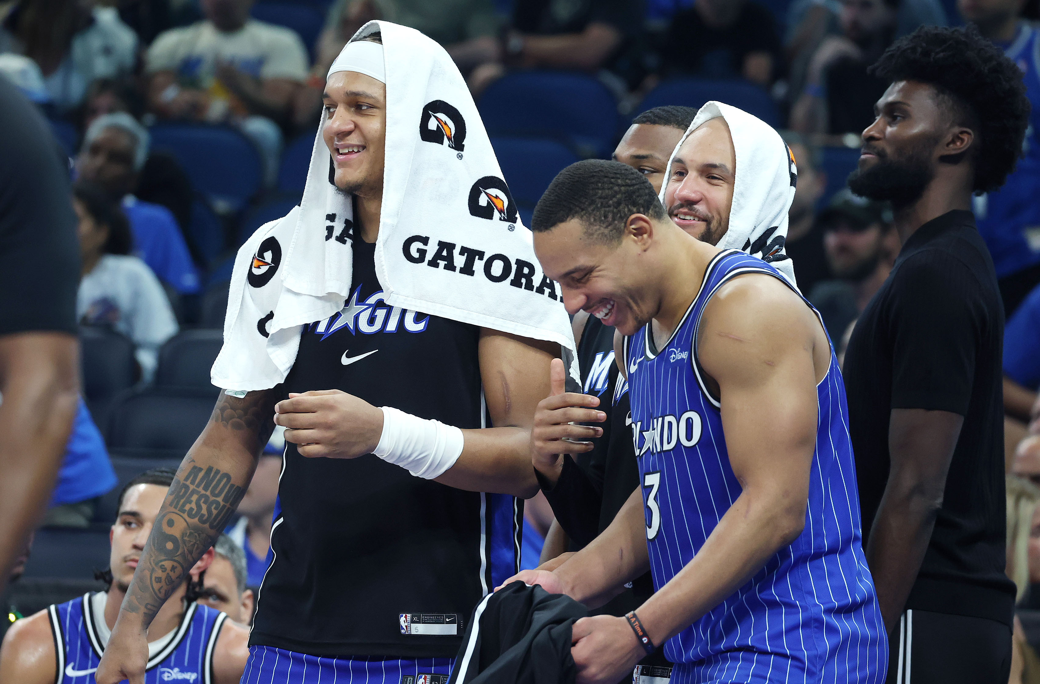 Orlando Magic players, from left: Paolo Banchero, Desmond Bane, Jalen...