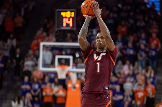 Virginia Tech forward Tobi Lawal (1) shoots the ball during the first half against Clemson in an NCAA college basketball game Wednesday, Feb. 11, 2026, in Clemson, S.C. (AP Photo/Scott Kinser)